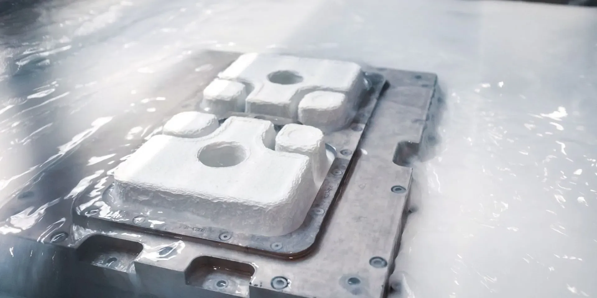 Molded fiber production line handling formed packaging components
