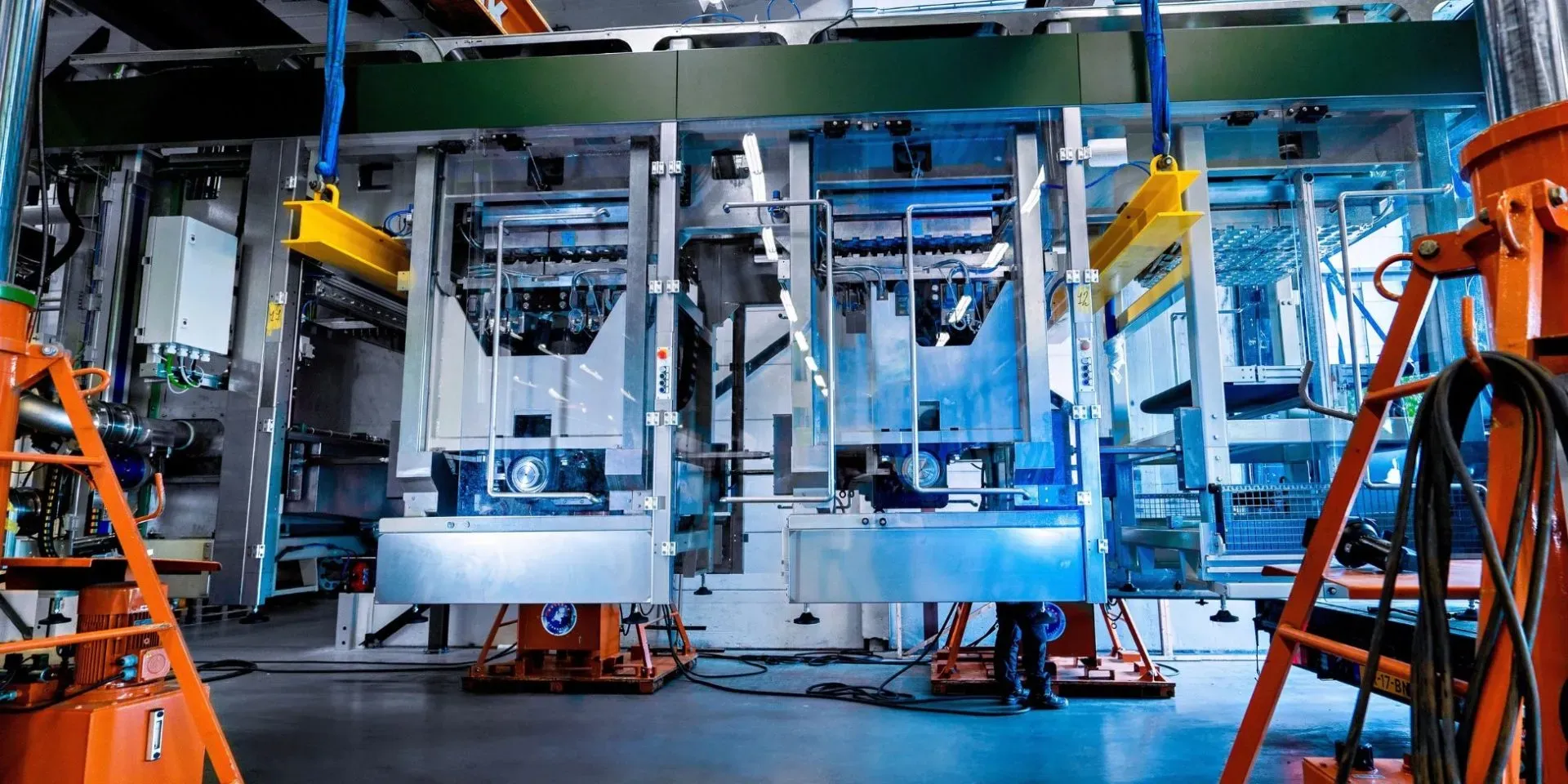 Finished molded fiber formats moving through production